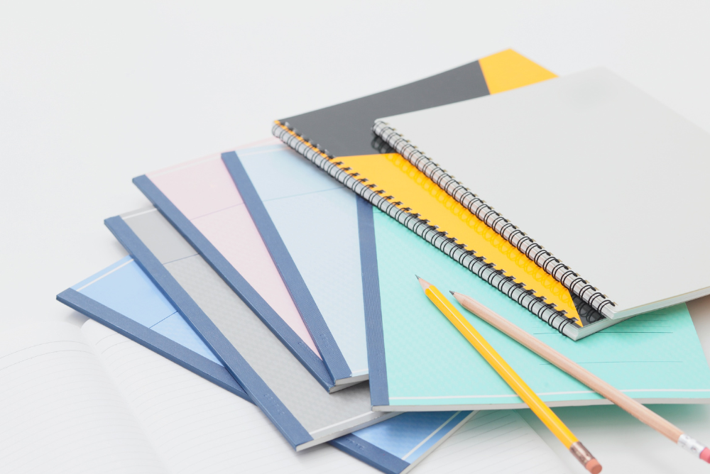 image of notebooks and pencils for blog post titled what are you trying to say